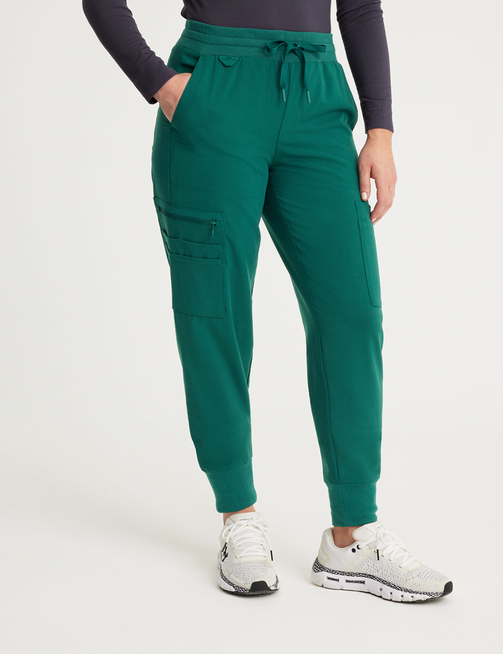 Hunter green women's scrub jogger pants with 12 pockets, offering a modern fit and practicality