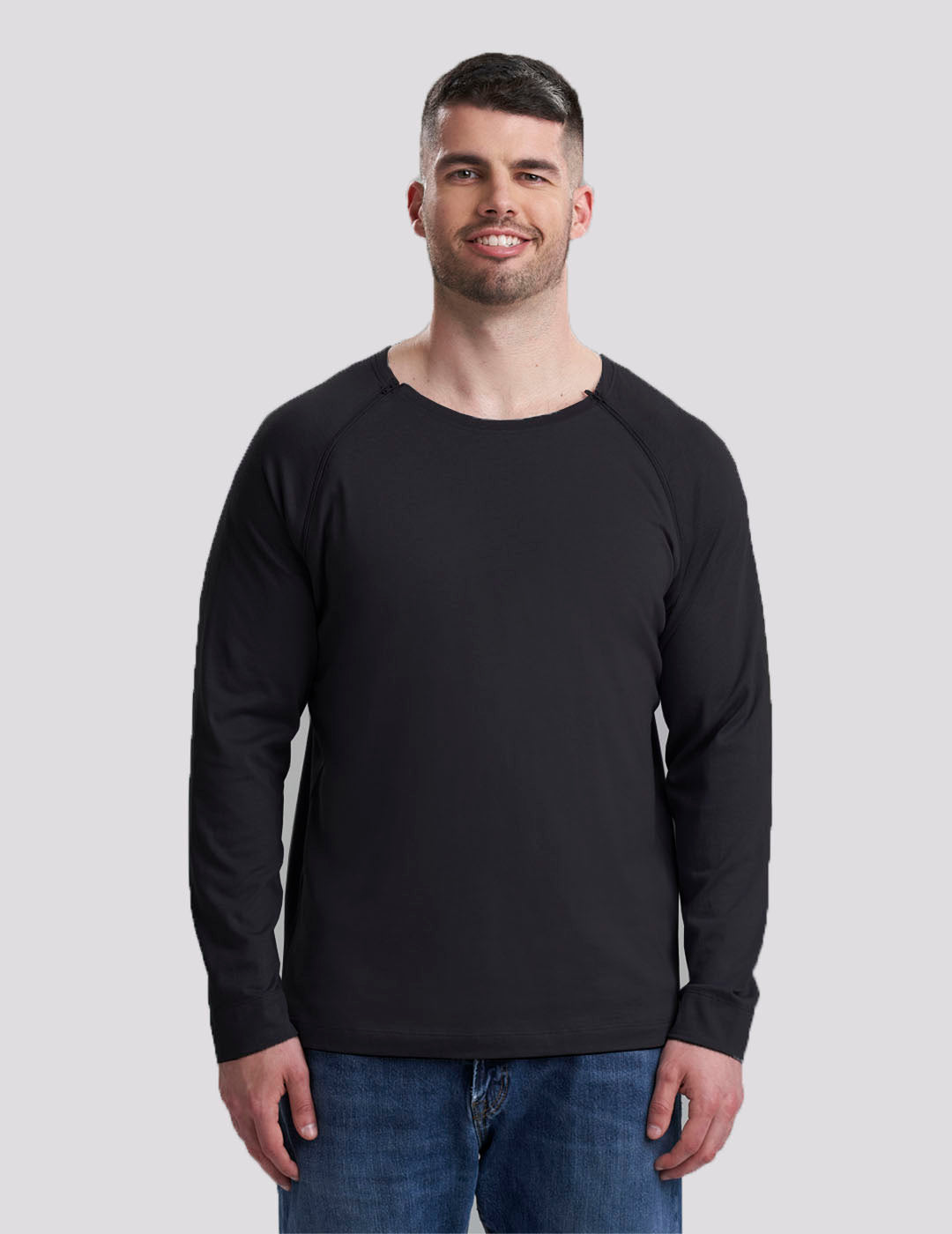 Sleek Black Men's Chest Port Access Shirt by Care+Wear, combining style with practical design for healthcare professionals. Model is wearing size Large