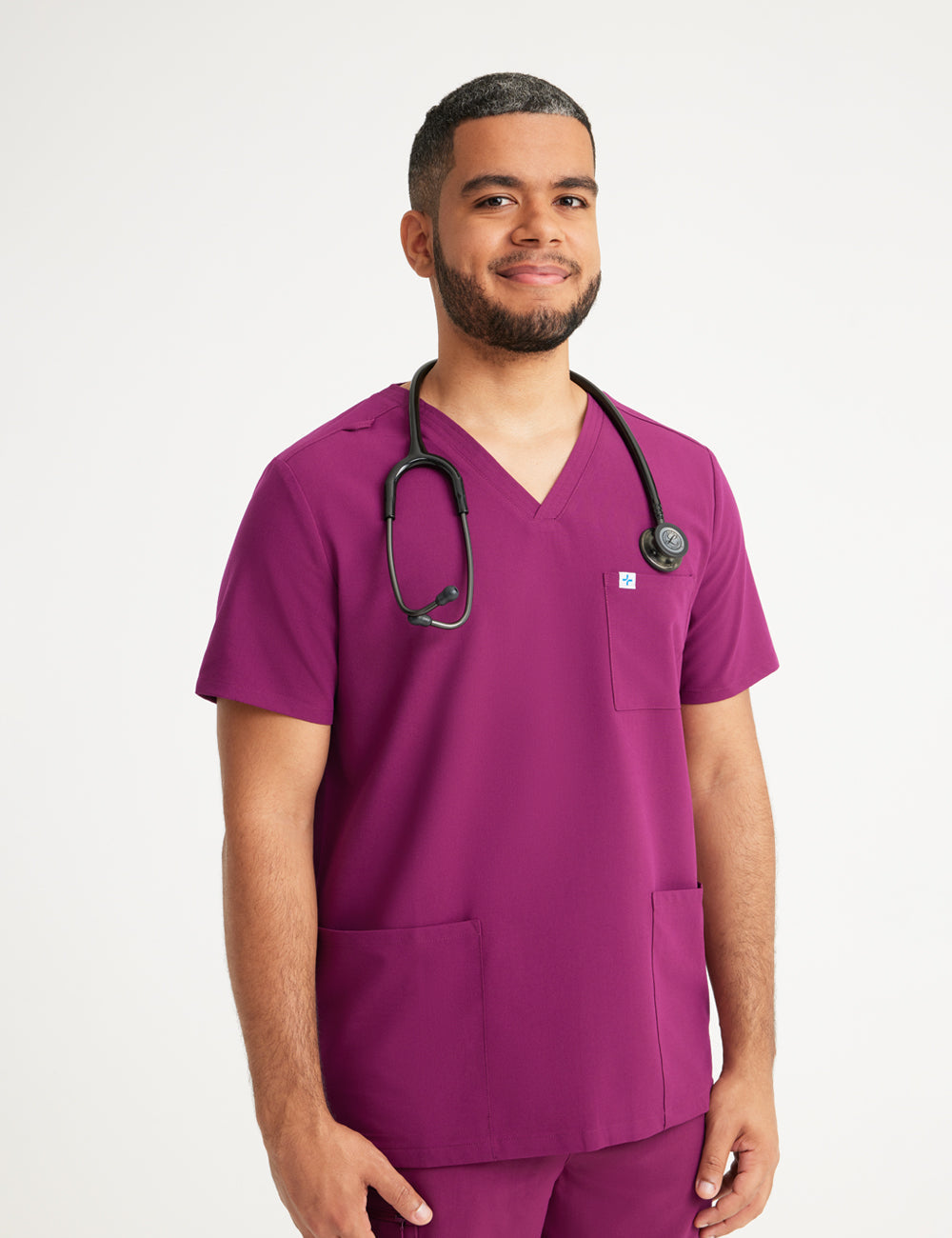 Burgundy men's V-neck scrub top with three pockets, combining style and practicality