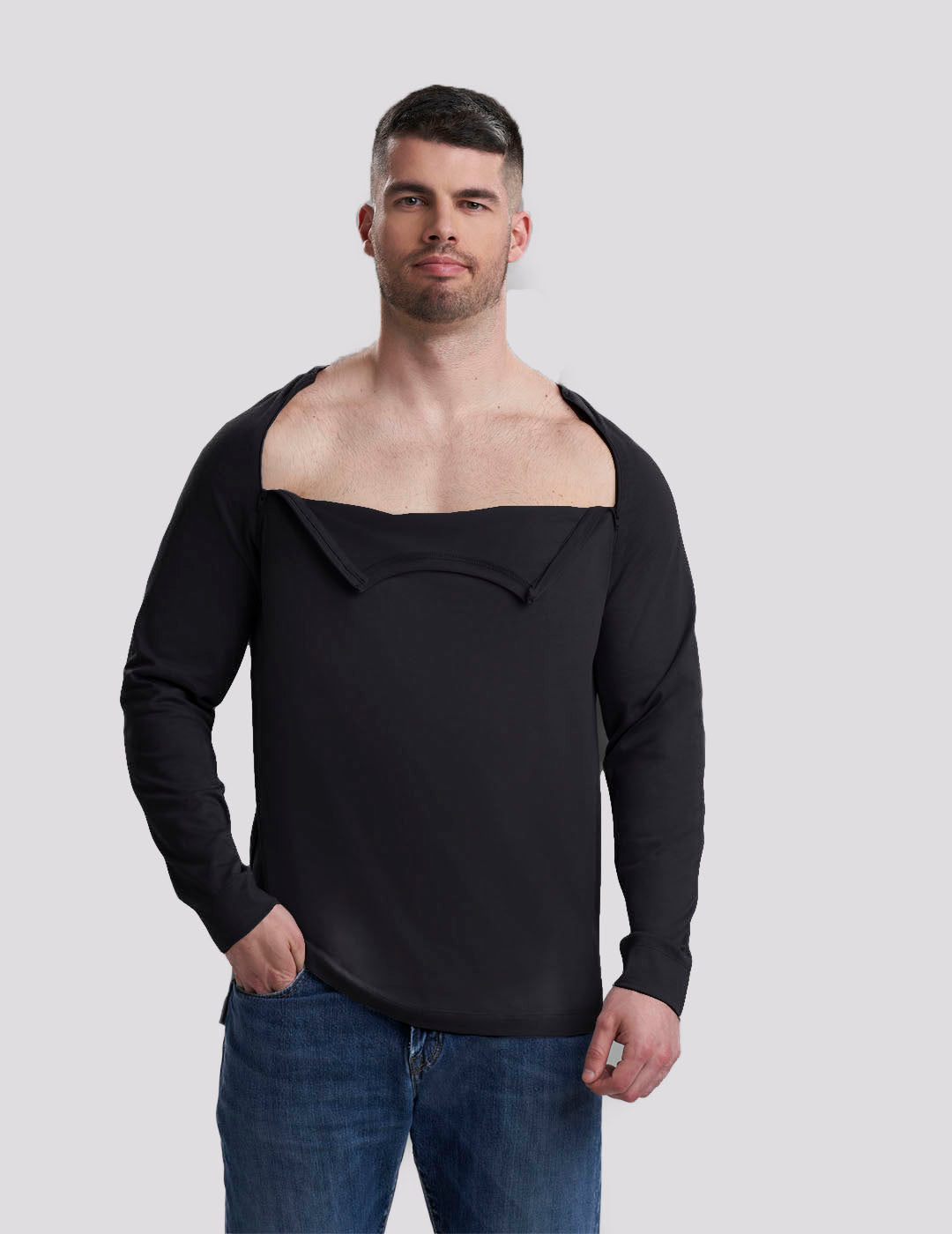 Men&#39;s black shirt with discreet chest port access, designed for ease and everyday wear