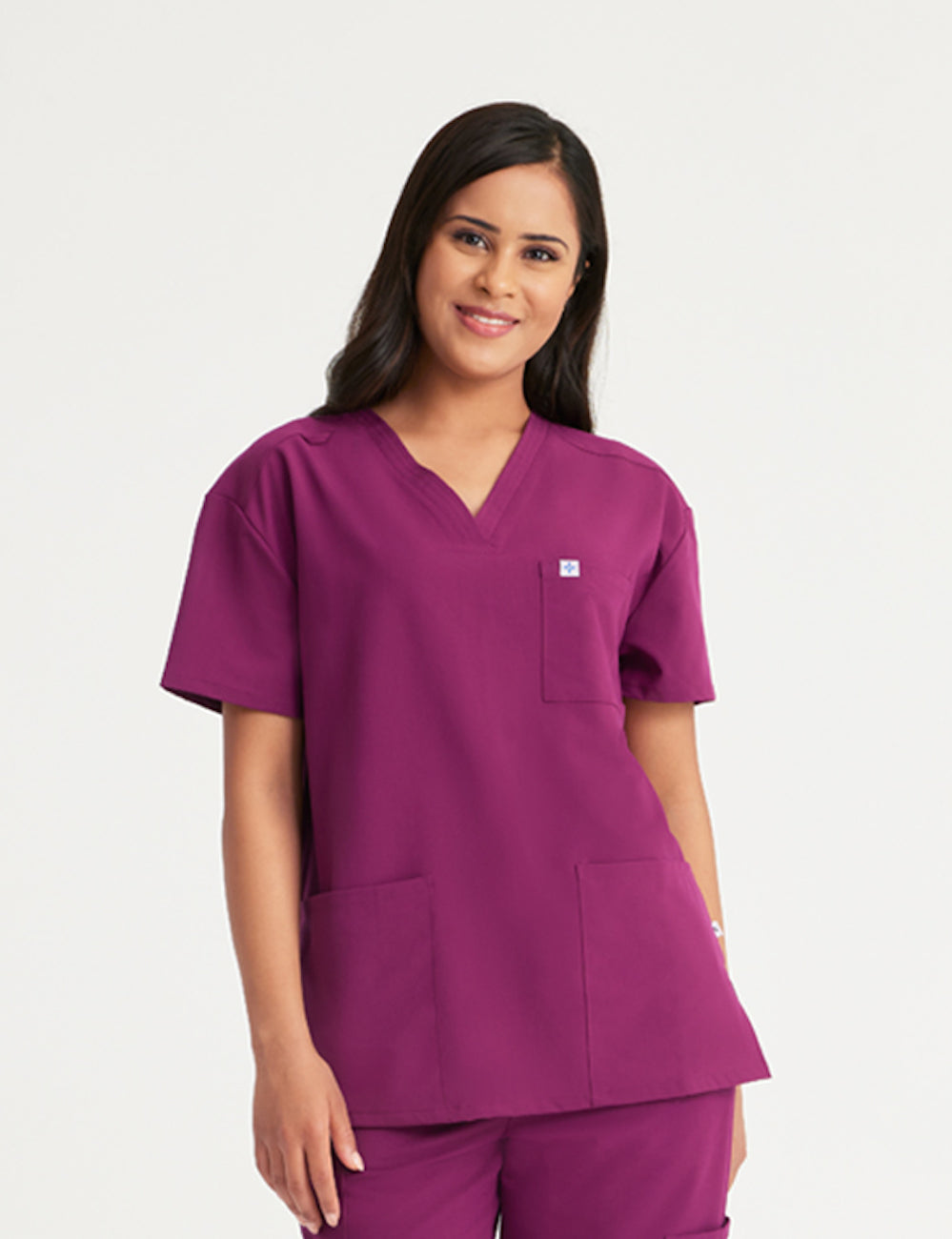Burgundy women's V-neck scrub top with three pockets, designed for style and utility