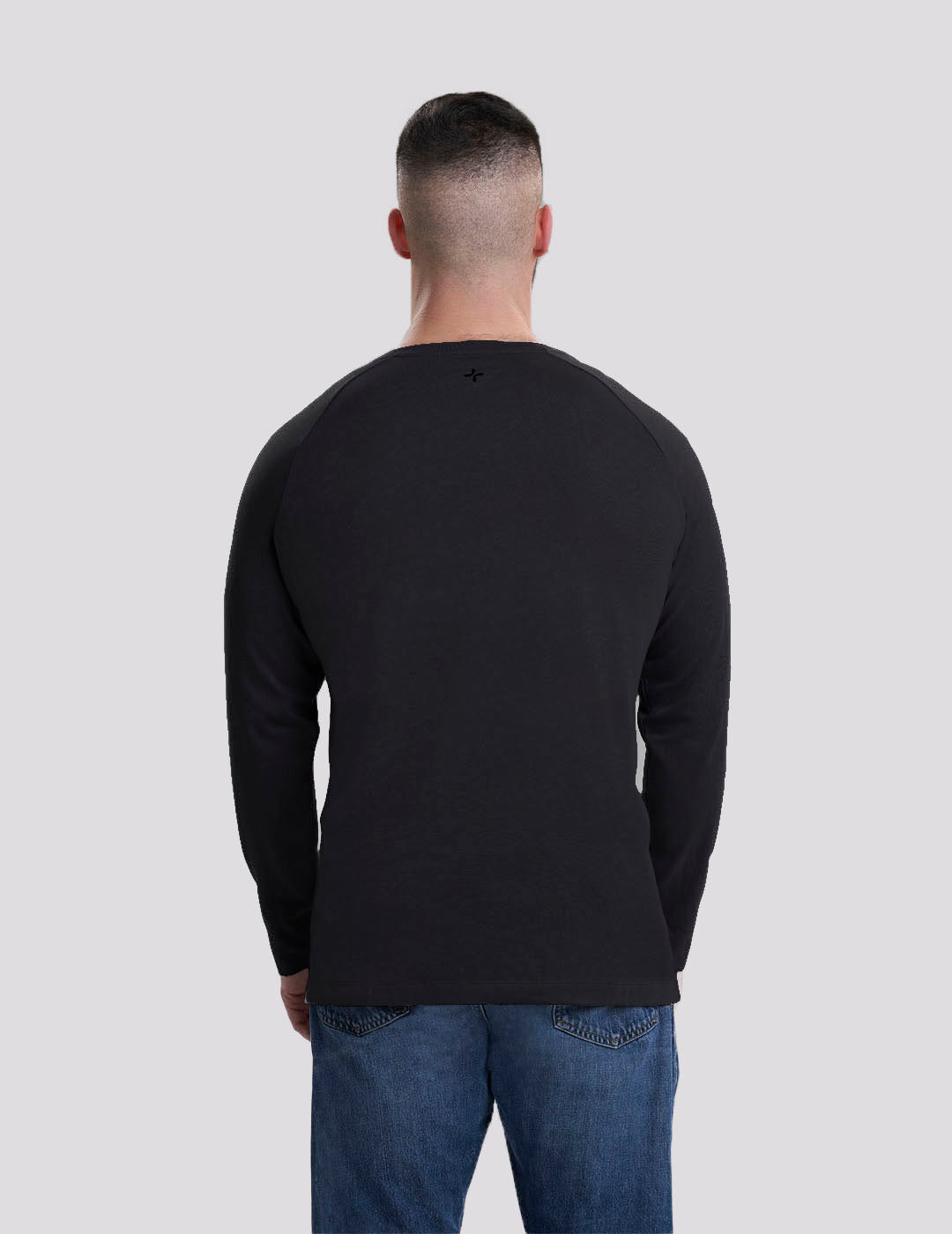 Sleek black men&#39;s chest port access shirt, combining style and functional design