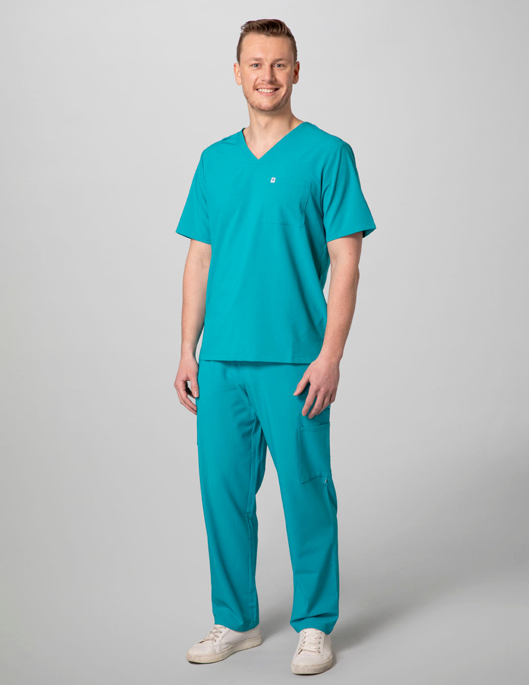 Durable teal V-neck scrub top for men, crafted for comfort and functionality in the workplace