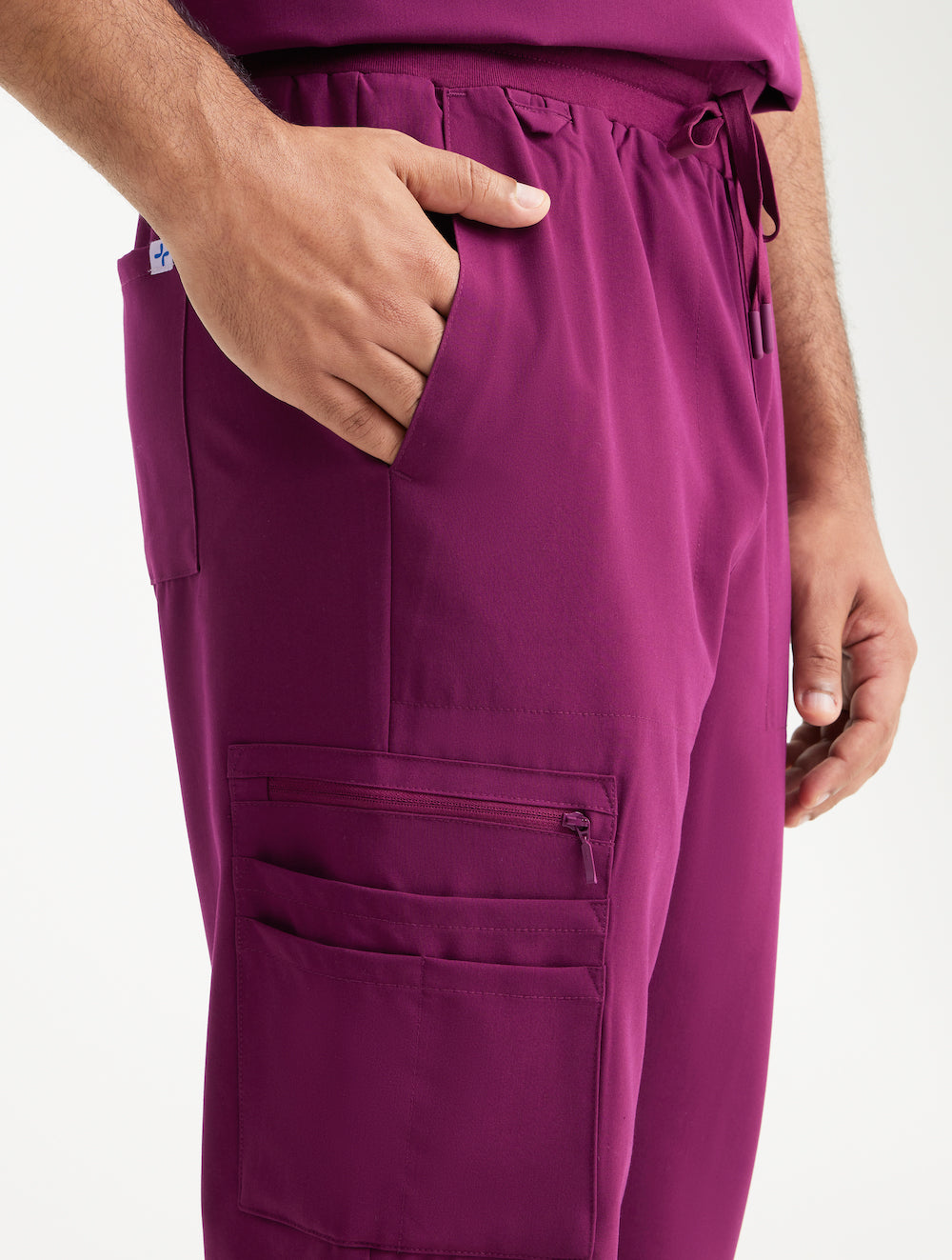 Durable burgundy jogger scrub pants for men, offering modern style and 10 pockets for convenience