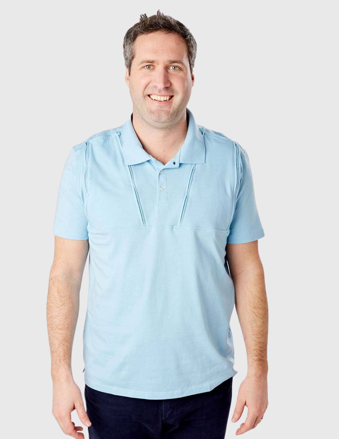 Care+Wear Men&#39;s Polo in navy blue offering dual chest port access for practical and stylish wear.