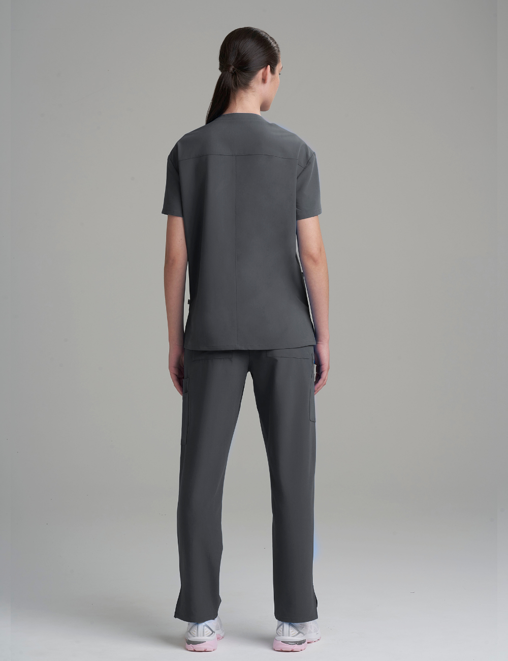 Stylish pewter scrub top for women, crafted with a three-pocket layout and a classic V-neck cut