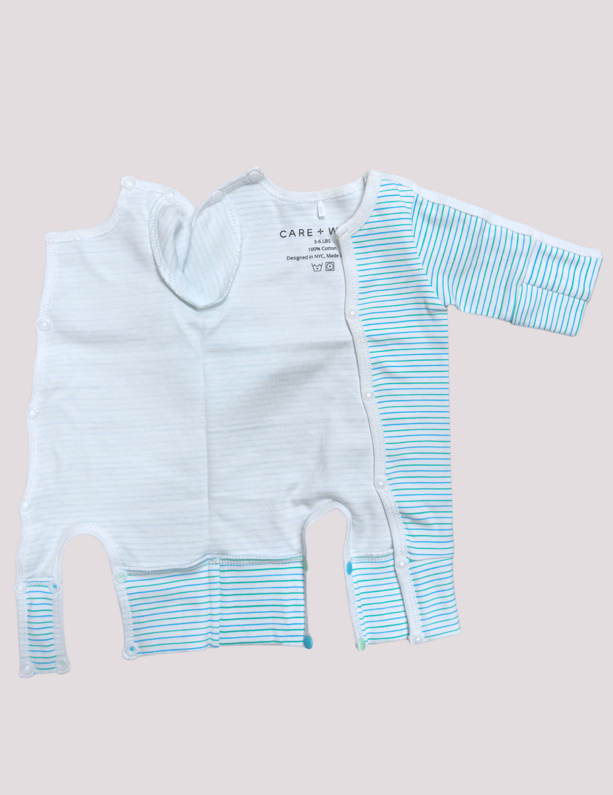 NICU-friendly preemie bodysuit in green and teal, offering softness and functionality by Care+Wear x March of Dimes