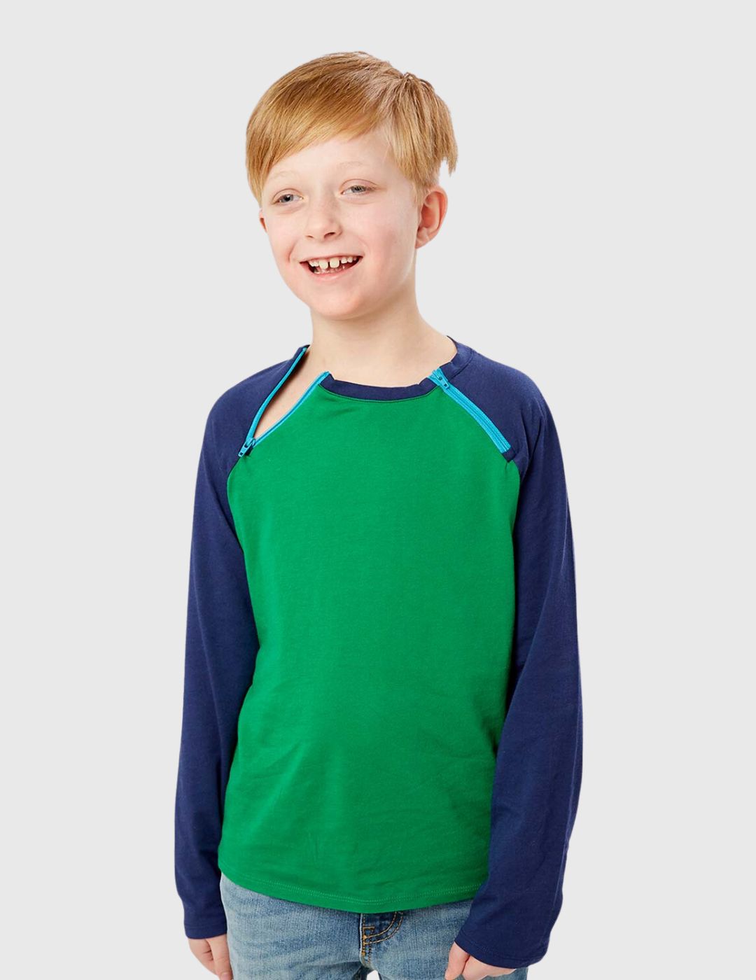 Care+Wear Kids Chest Port Access Shirt in a Jungle/Navy mix, providing comfort, durability, and playful style for young patients. Model is wearing size Medium
