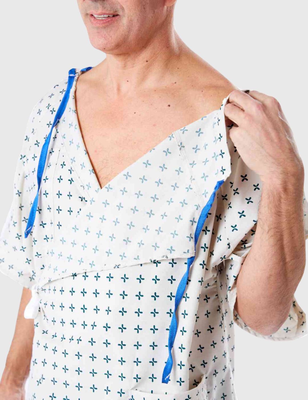 Hospital patient gown by Care+Wear x Parsons featuring standard plastic snaps, providing lightweight comfort and secure closure