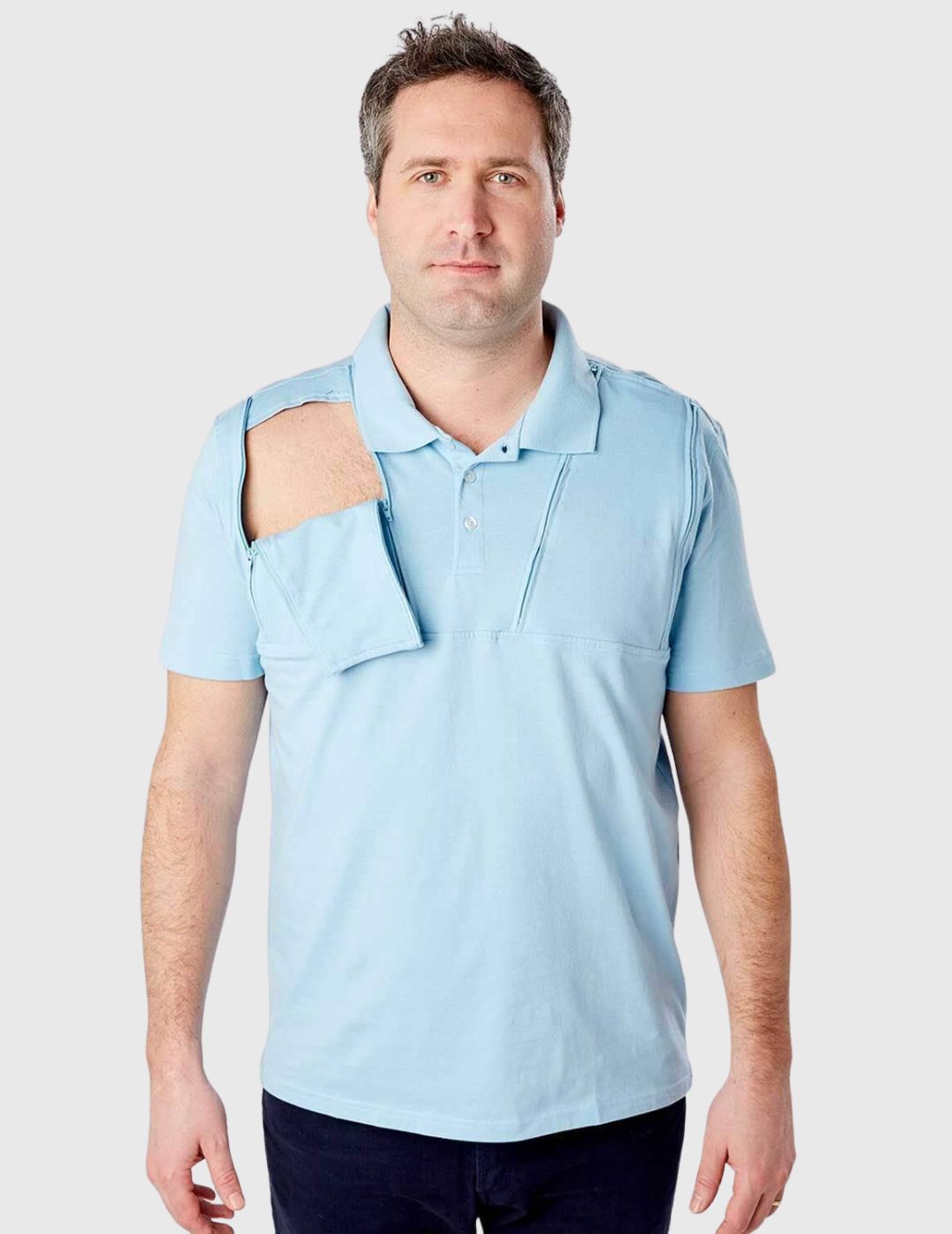 Men&#39;s dual chest port access polo in elegant navy blue from Care+Wear, ideal for professional wear.