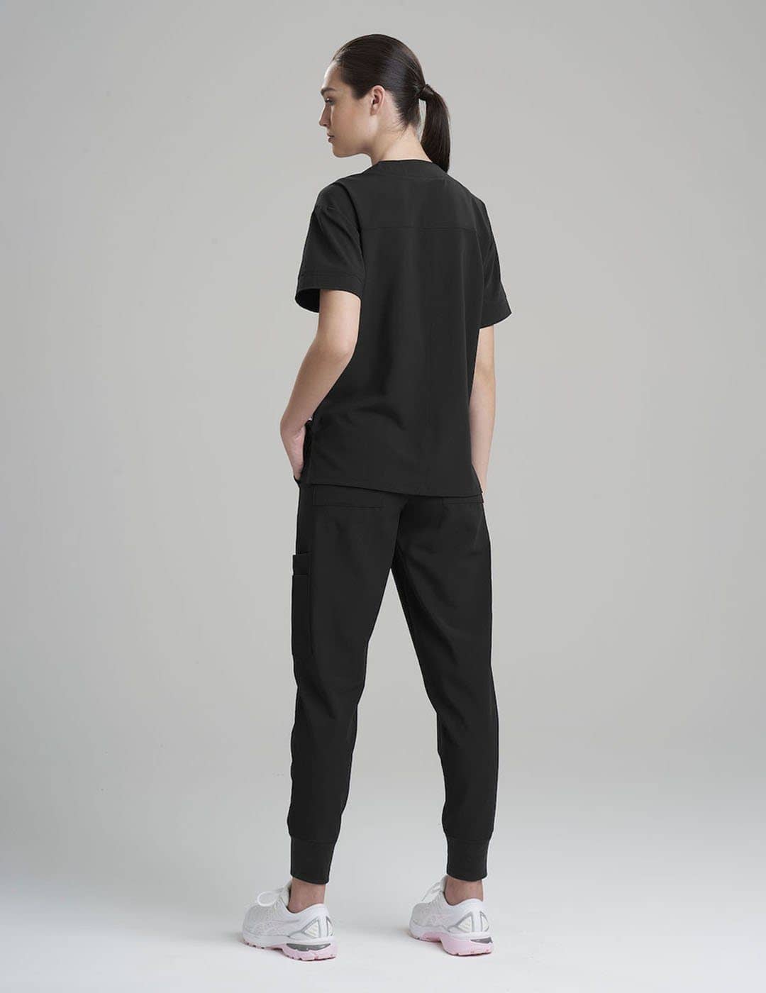 Durable and stylish ceil V-neck scrub top for women, featuring eight pockets for essential tools.