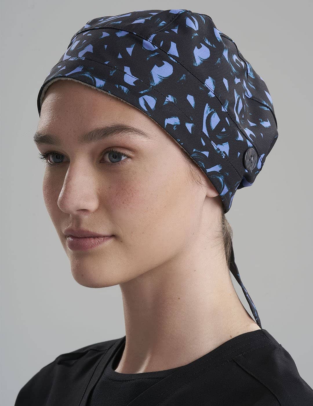 Professional unisex scrub cap, crafted for secure wear and reliable comfort during long shifts.