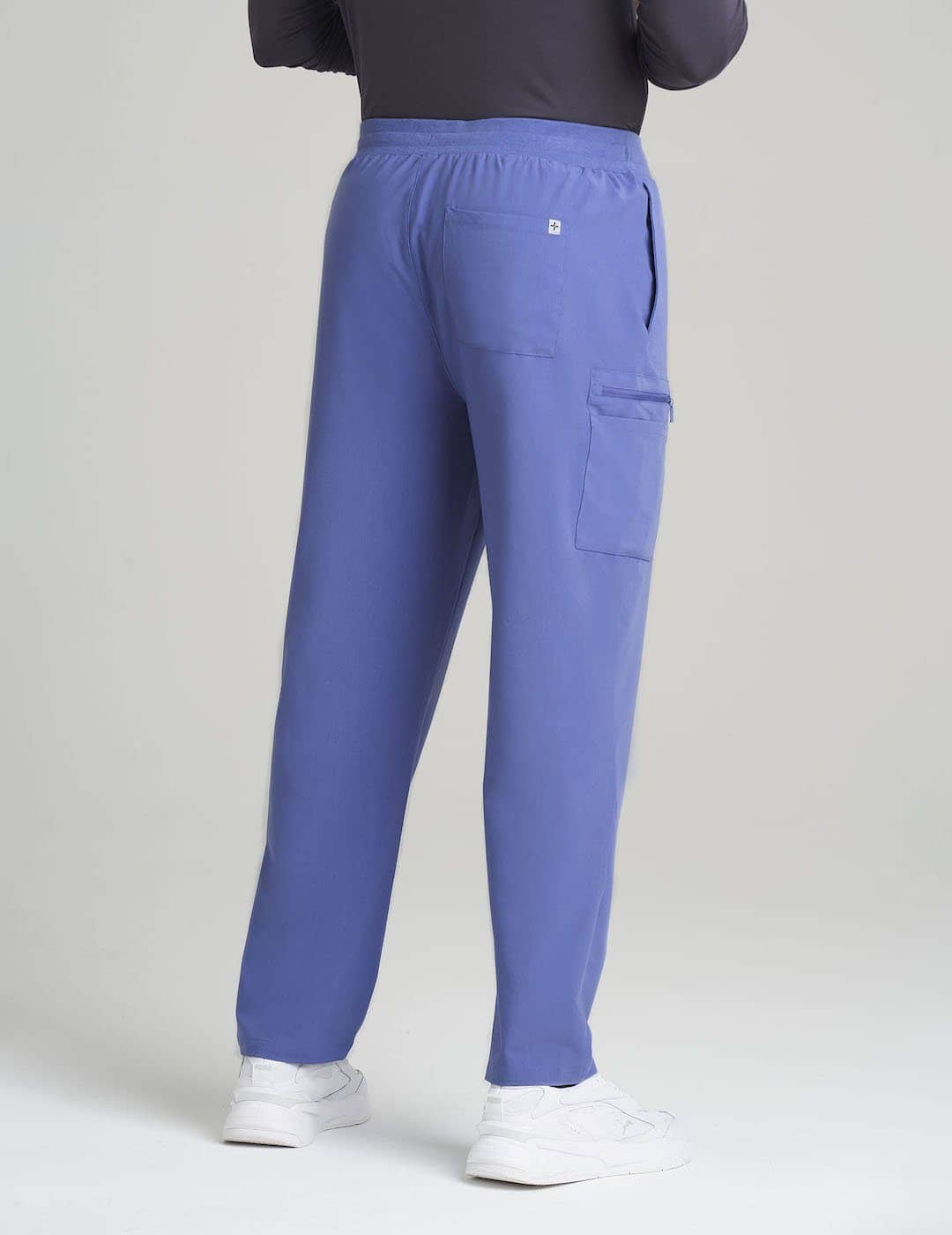 Men&#39;s 7-pocket scrub pants in ceil, offering a modern fit and ample storage options