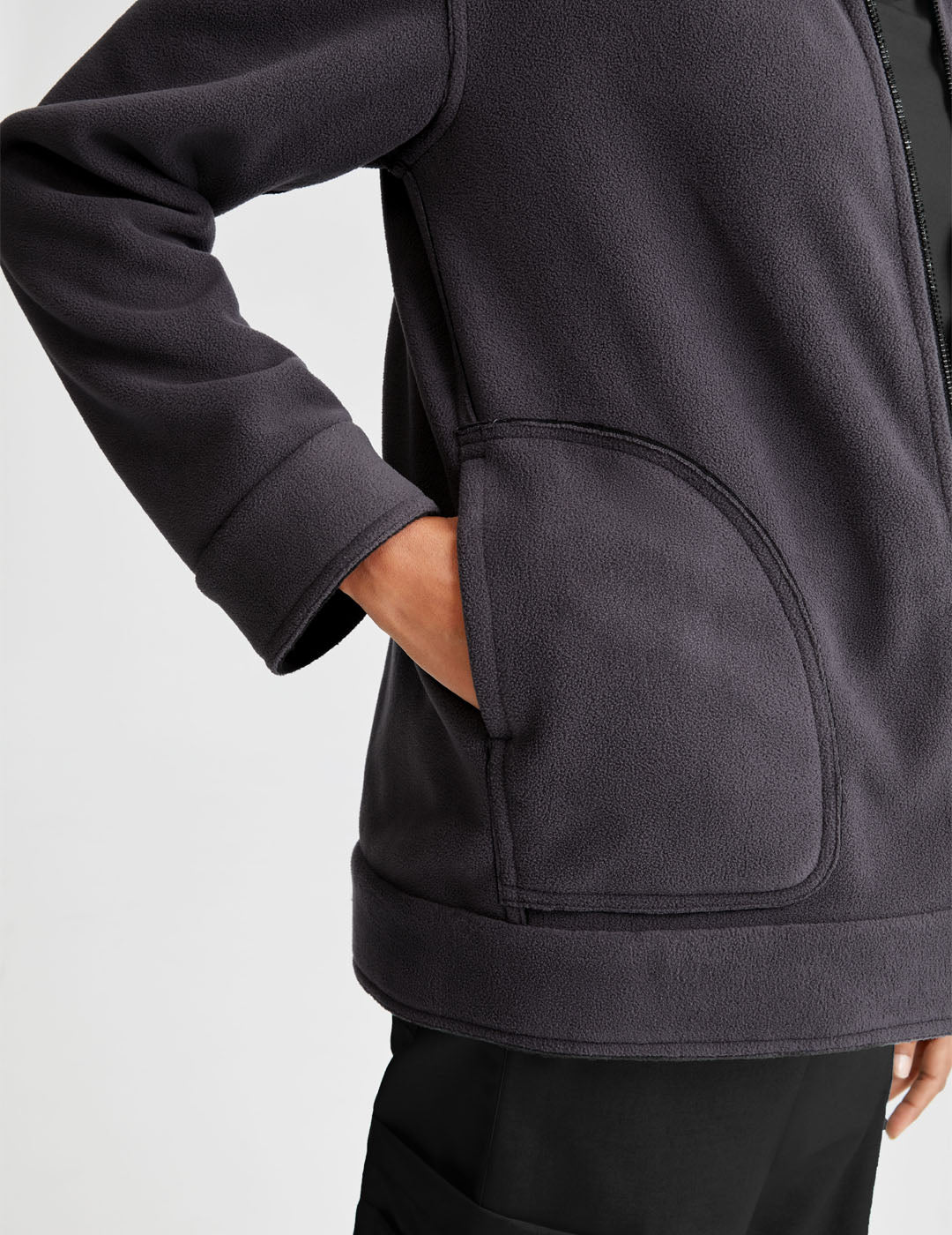 Comfortable black and gray fleece jacket for women, perfect for layering and mixing up your look