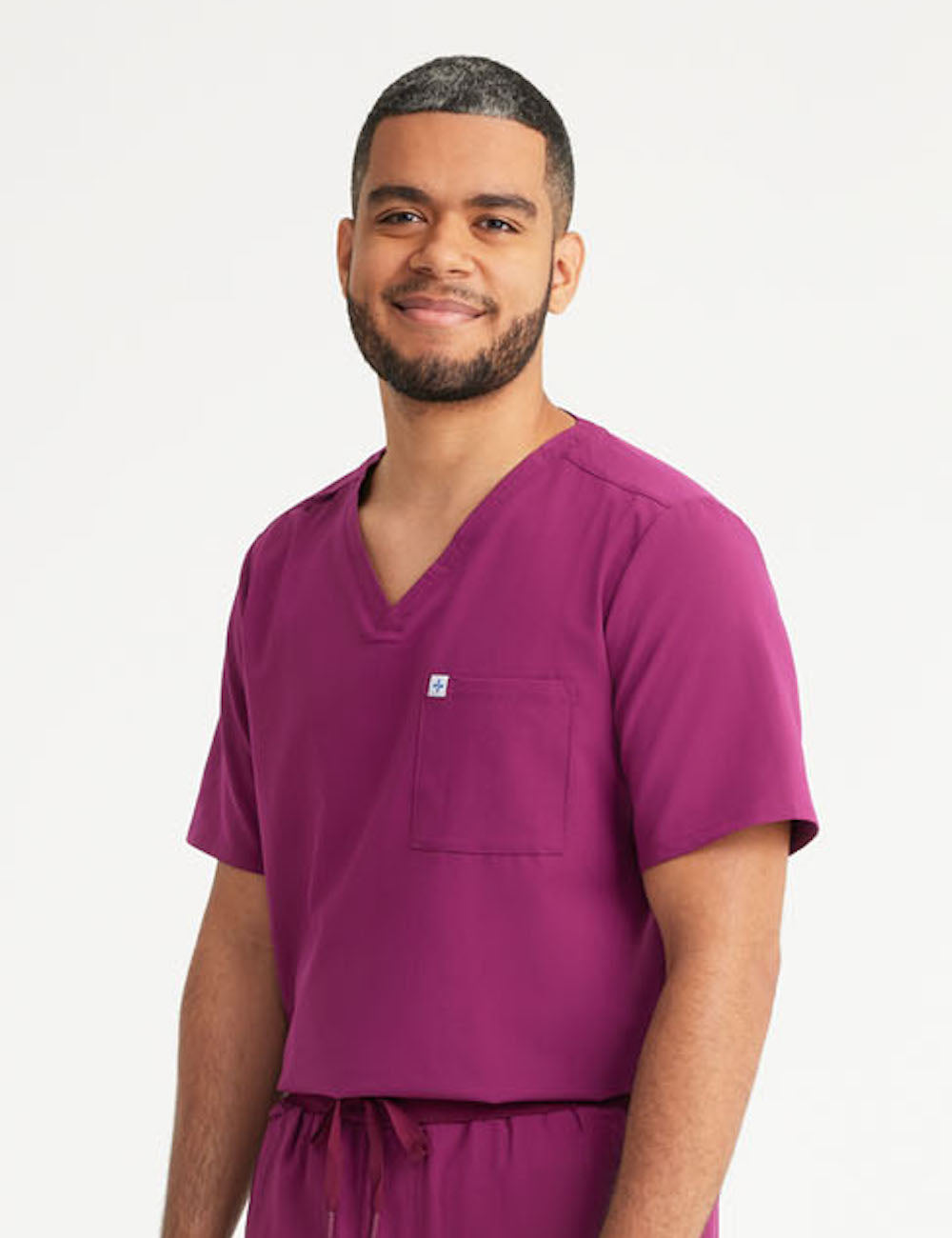 Burgundy men's V-neck scrub top with two pockets, designed for comfort and practicality