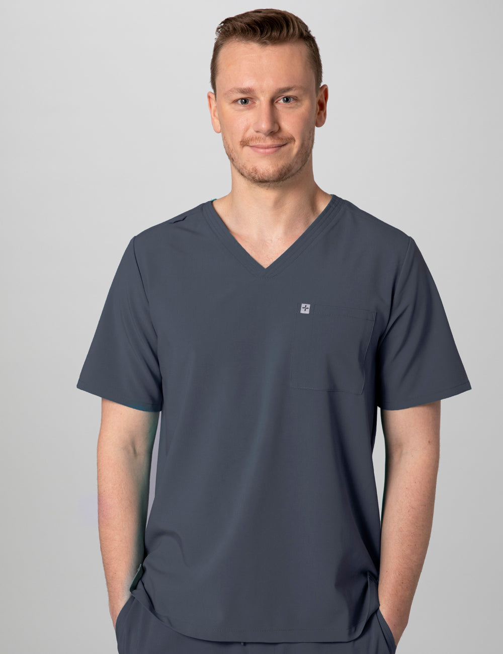 Pewter men&#39;s V-neck scrub top with two pockets, combining style and function for professional wear
