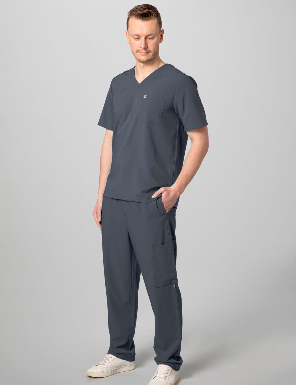Durable pewter V-neck scrub top for men, designed for comfort and utility in work environments