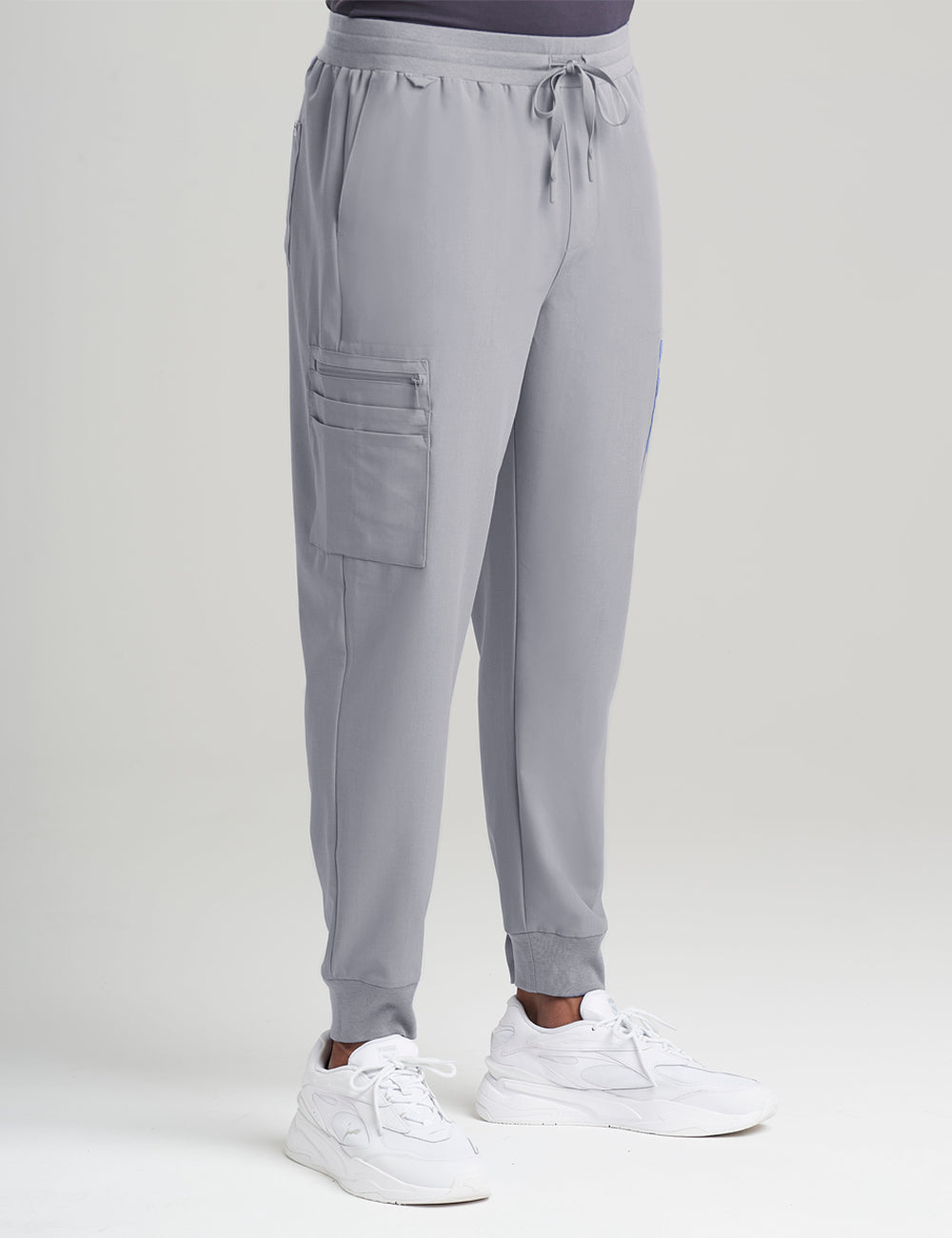 Stone gray men's jogger scrub pants with 10 pockets, combining sleek style and functionality