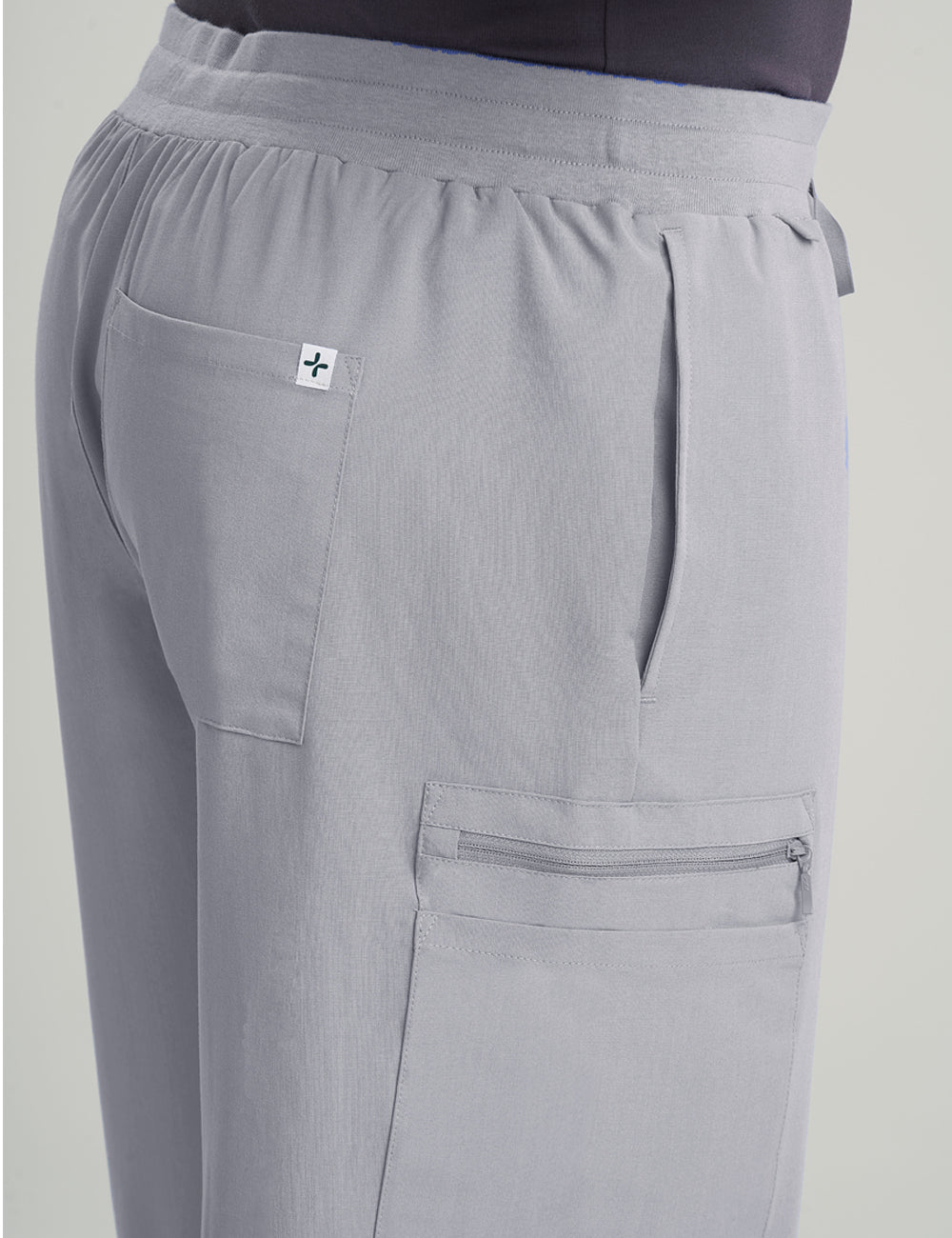 Stone gray men's scrub pants with seven pockets, designed for professional wear and functionality