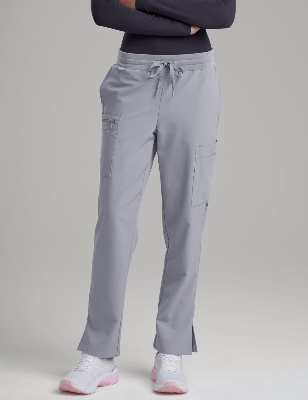 Stone gray women's straight-leg scrub pants with nine pockets, designed for practicality and style