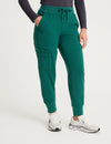 Women's jogger scrub pants in hunter green, combining a modern look with practical features for healthcare settings