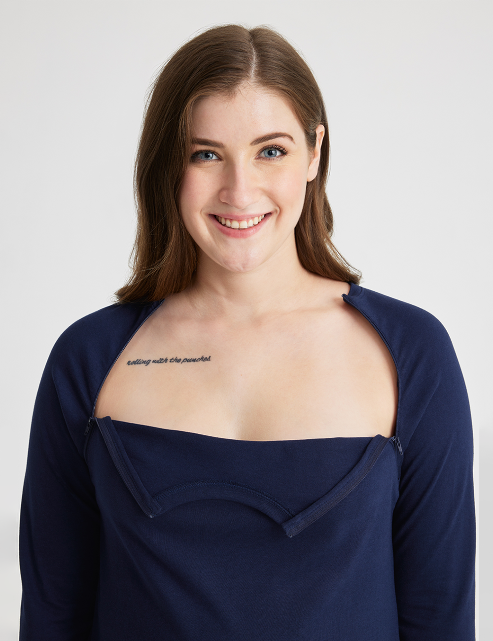 Versatile teal Women's Chest Port Access Shirt from Care+Wear, ideal for merging professional style with practical medical access features. Model is wearing size Small