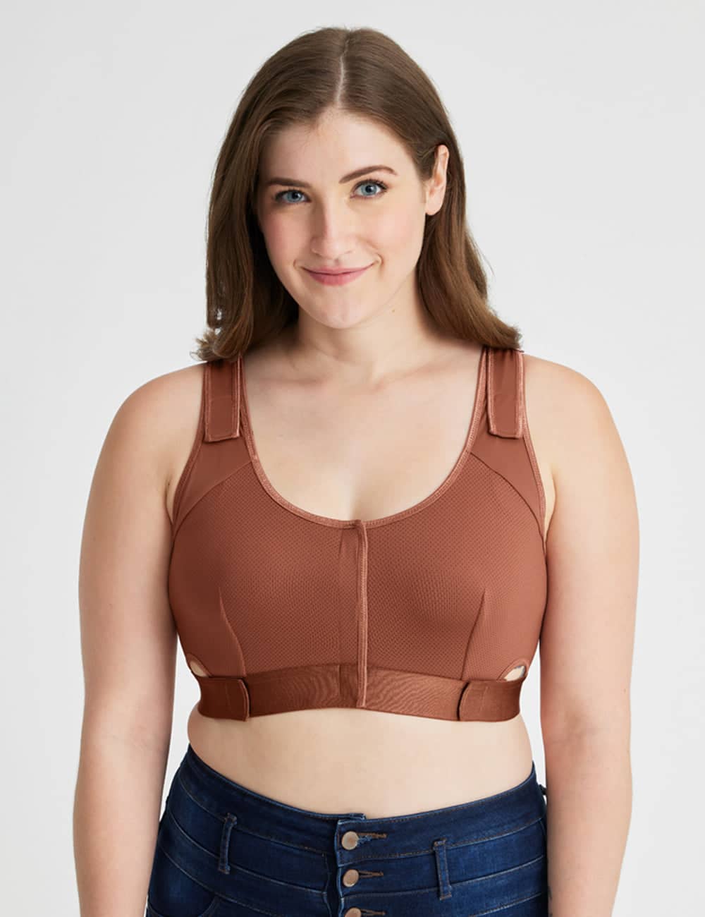 Nude-colored Surgical Bra designed for mastectomy recovery, providing a natural look under clothing with reliable support. Model is wearing size Medium