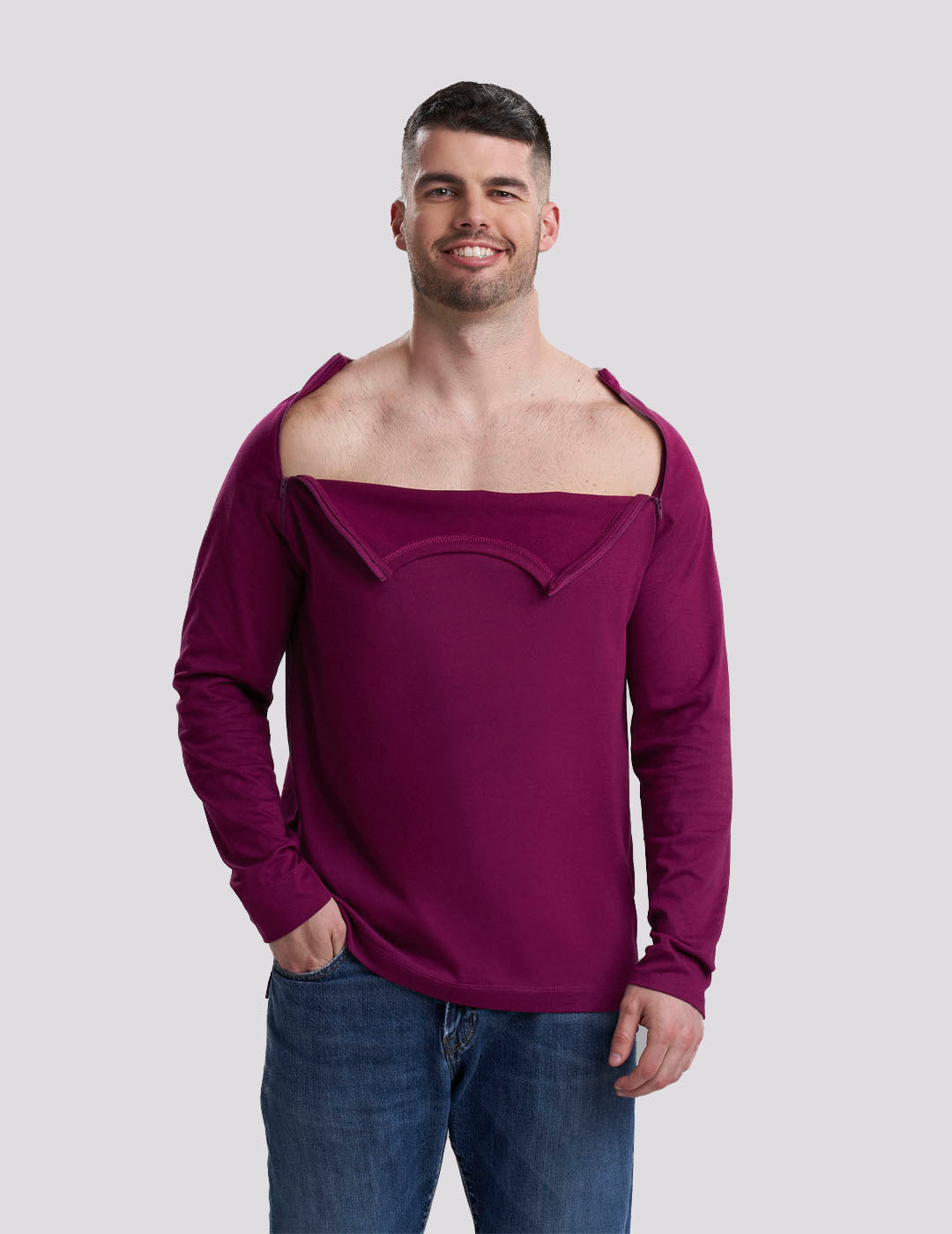 Stylish maroon men&#39;s shirt with chest port access, combining practicality with a bold hue.