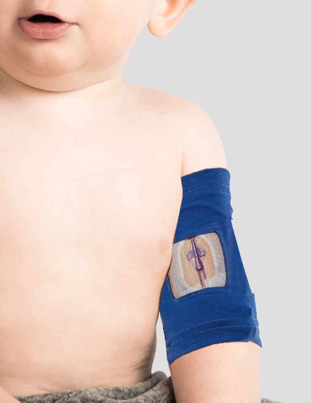 Kids PICC Line Cover. Model is wearing size 7"-9" Bicep