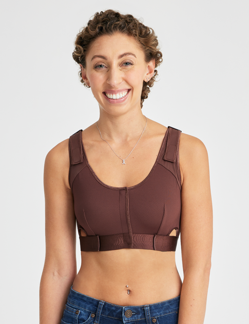 The Believer Bra, featuring premium materials and secure support for comfortable post-surgical wear. Model is wearing size Small