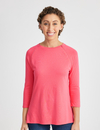 Women's chest port access shirt in coral, featuring a vibrant and comfortable design for healthcare needs