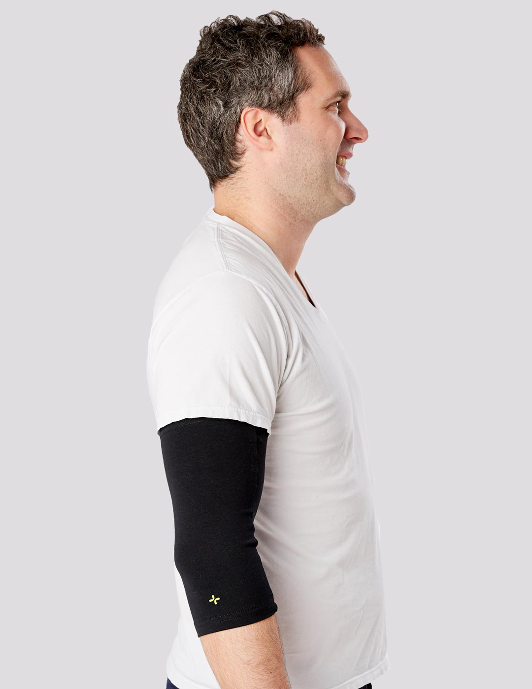 Durable marine blue PICC Line Sleeve by Care+Wear, designed to provide secure and hygienic protection for PICC lines. Model is wearing size 13&quot;-15&quot; Bicep