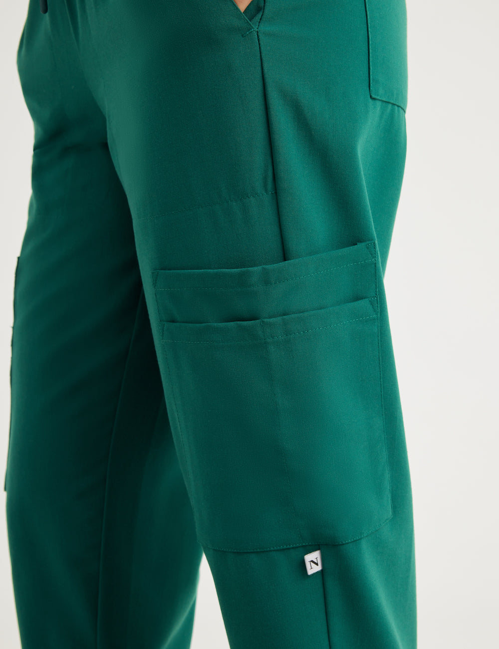 Women&#39;s 12-pocket scrub jogger pants in ceil, offering a modern fit and functional design.