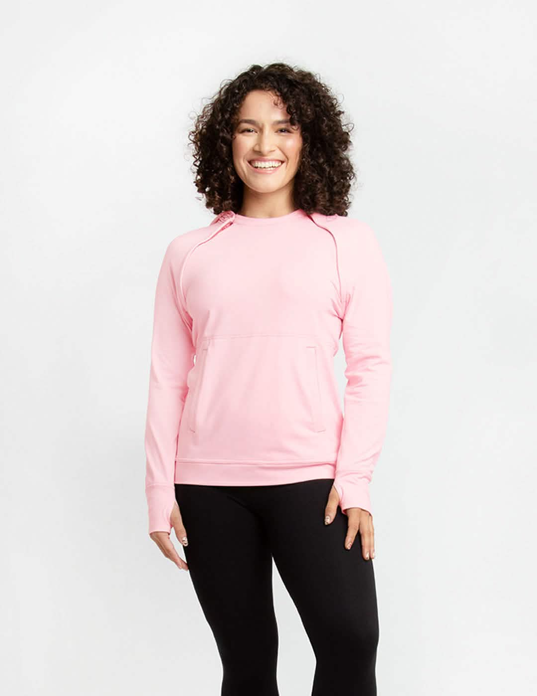 Red women&#39;s chest port access hoodie by Oscar de la Renta, combining elegance with practical medical design. Model is wearing size Small