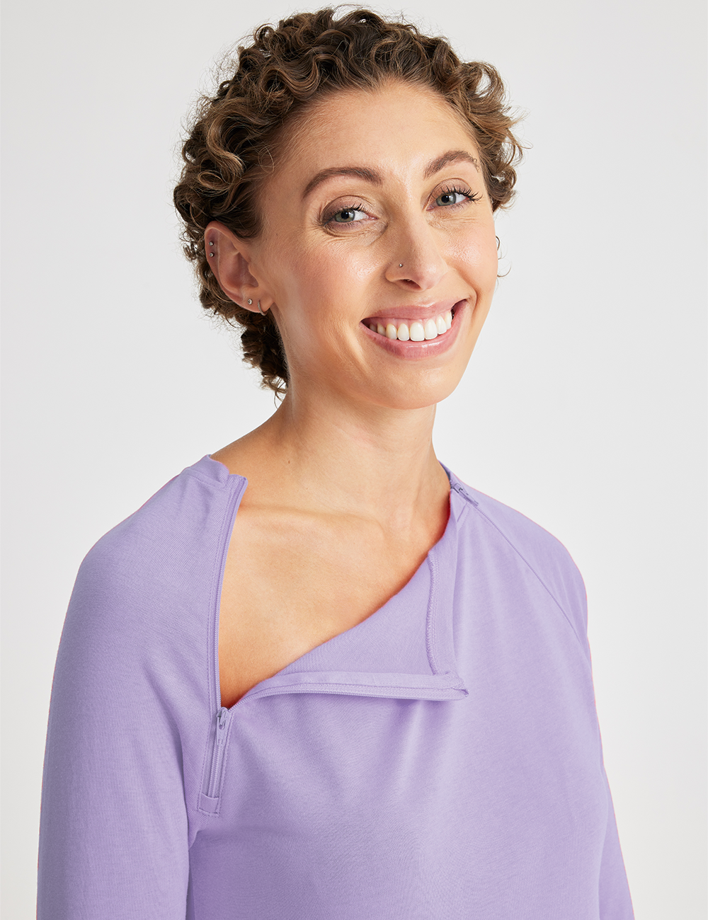 Care+Wear Women&#39;s Shirt in teal featuring convenient chest port access, perfect for healthcare professionals and comfort seekers.