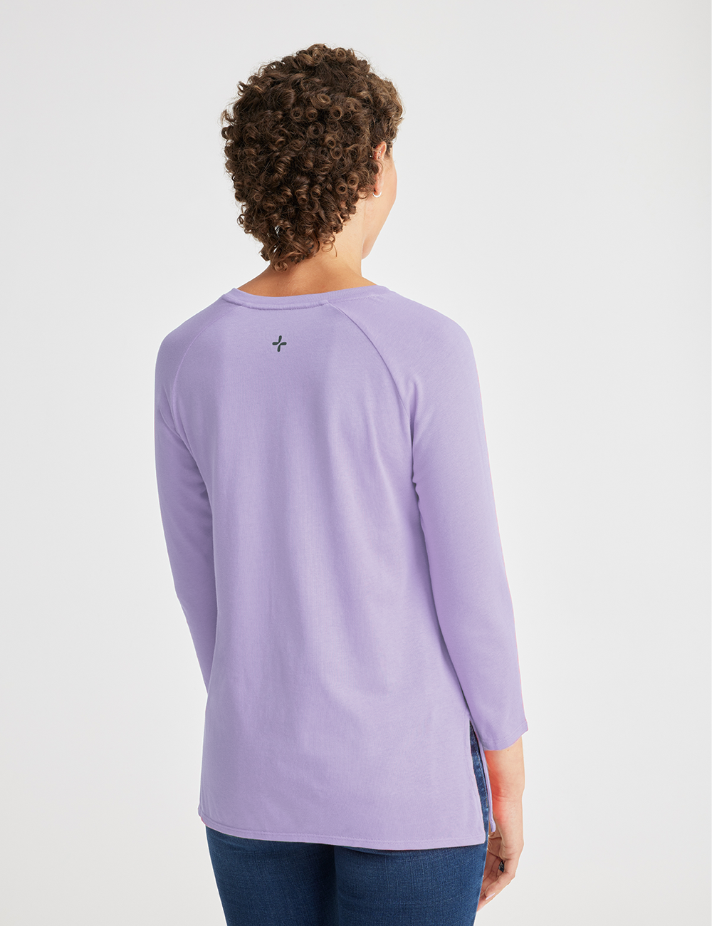 Soft and modern teal Women&#39;s Chest Port Access Shirt by Care+Wear, offering both style and utility for everyday wear.