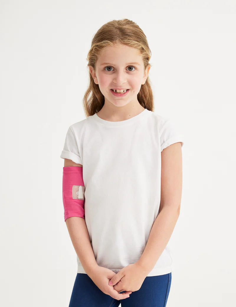 Kids&#39; PICC line cover in fuchsia, featuring a vibrant and stylish design with a snug fit