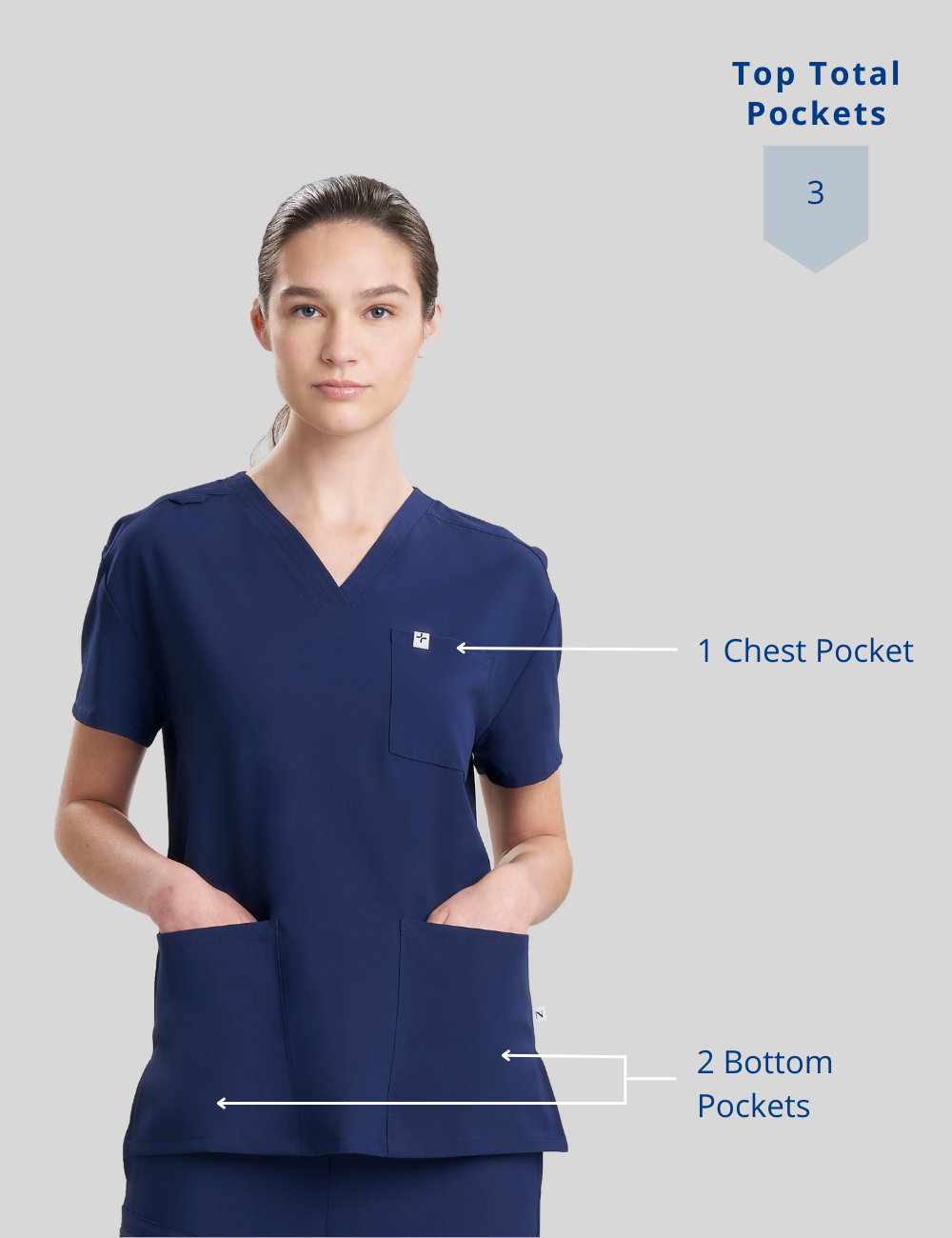 Stylish stone gray women&#39;s scrub top, offering three pockets and a flattering V-neck for professional use.