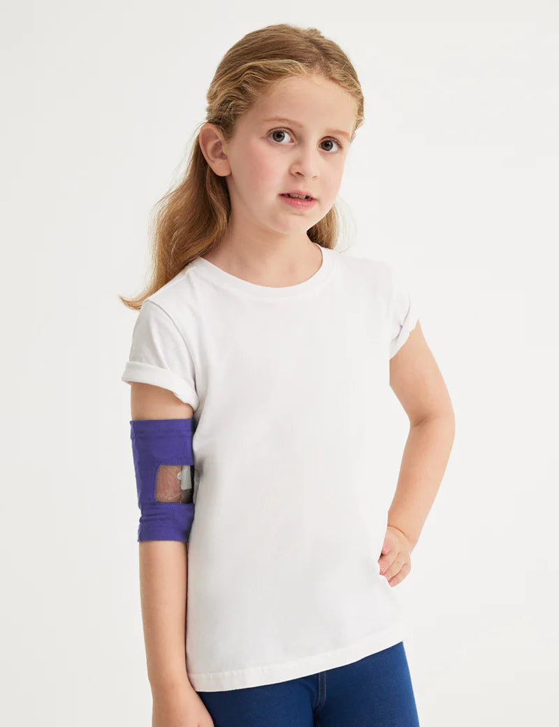 Kids&#39; PICC line cover in violet, offering a colorful and functional design for everyday wear