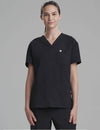 Women's V-neck scrub top in black, designed for a sleek and versatile appearance for medical professionals