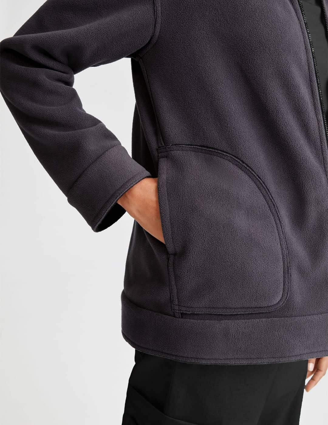 Women&#39;s professional fleece jacket, reversible in black and gray, crafted for warmth and functionality.