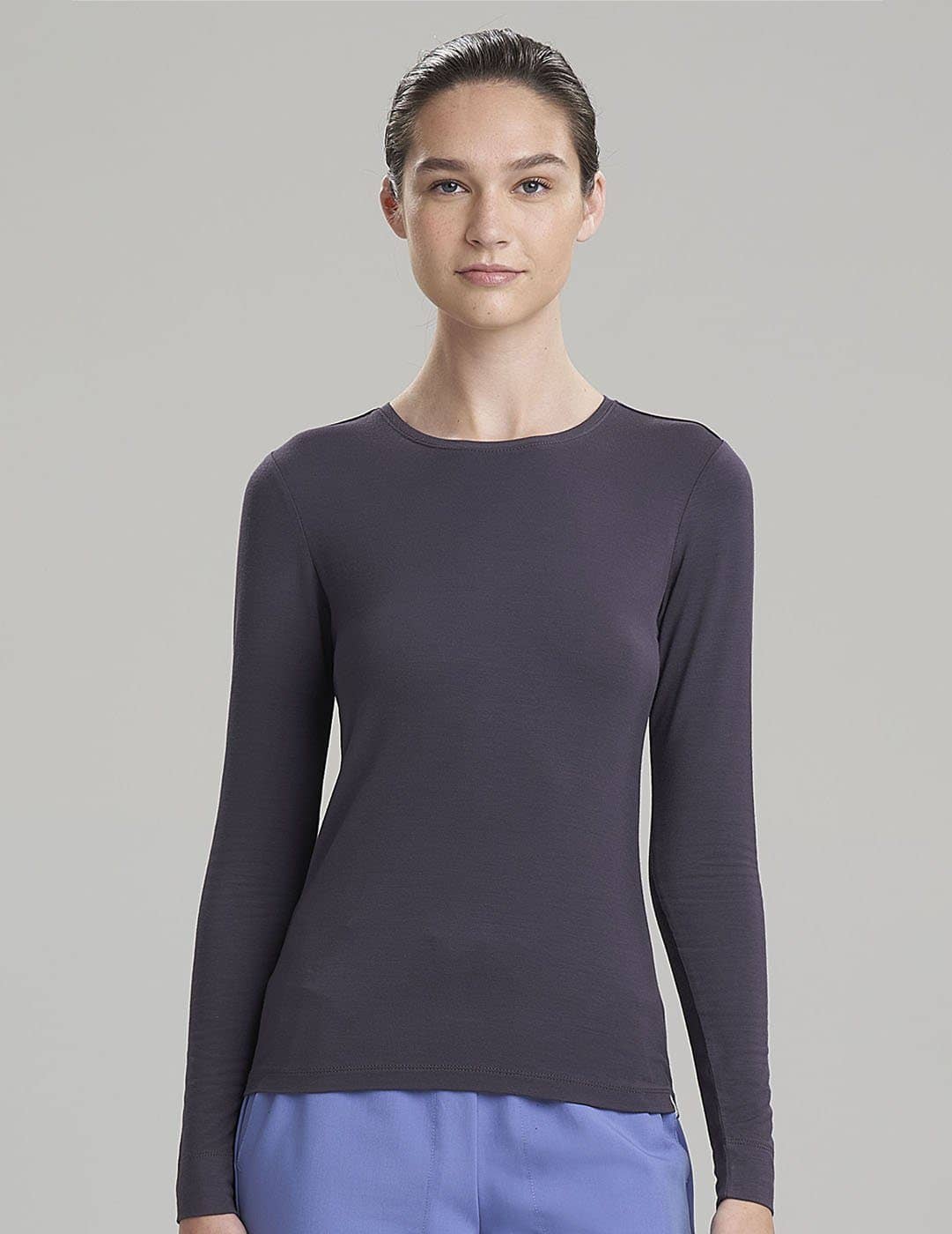 Women's Luxe long sleeve underscrub shirt in gray, offering a sleek design with premium fabric.