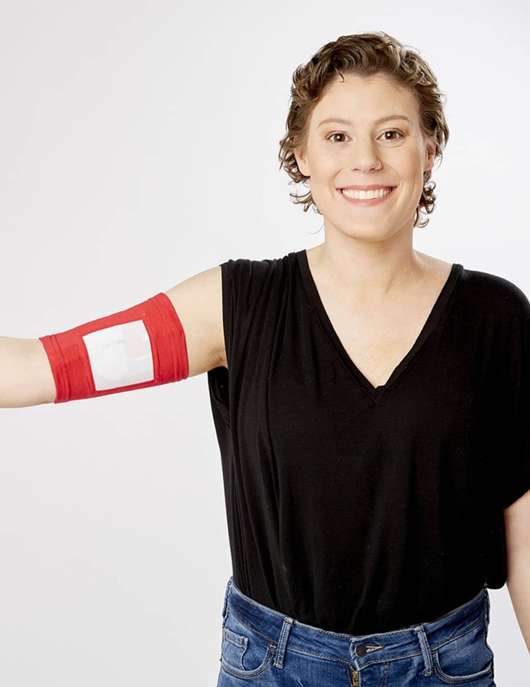Care+Wear Classic PICC Line Cover in bold red, providing strong visibility alongside advanced antimicrobial protection.
