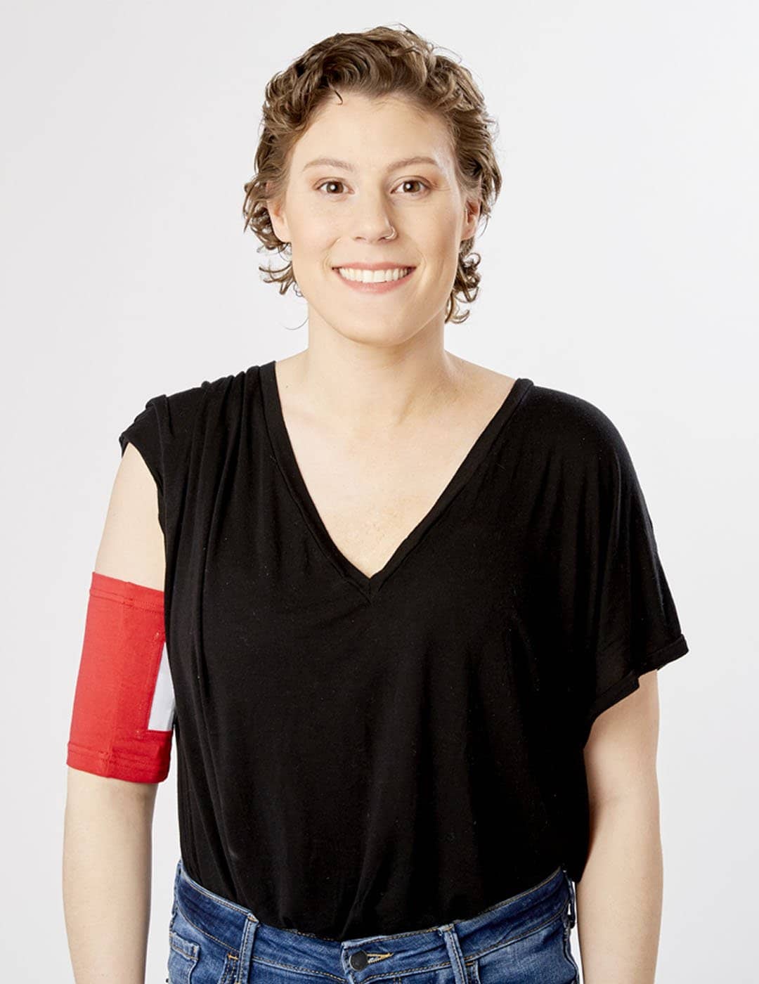 Stylish fuschia Classic PICC Line Cover by Care+Wear, blending vibrant style with reliable hygienic protection. Model is wearing size 11&quot;-13&quot; Bicep