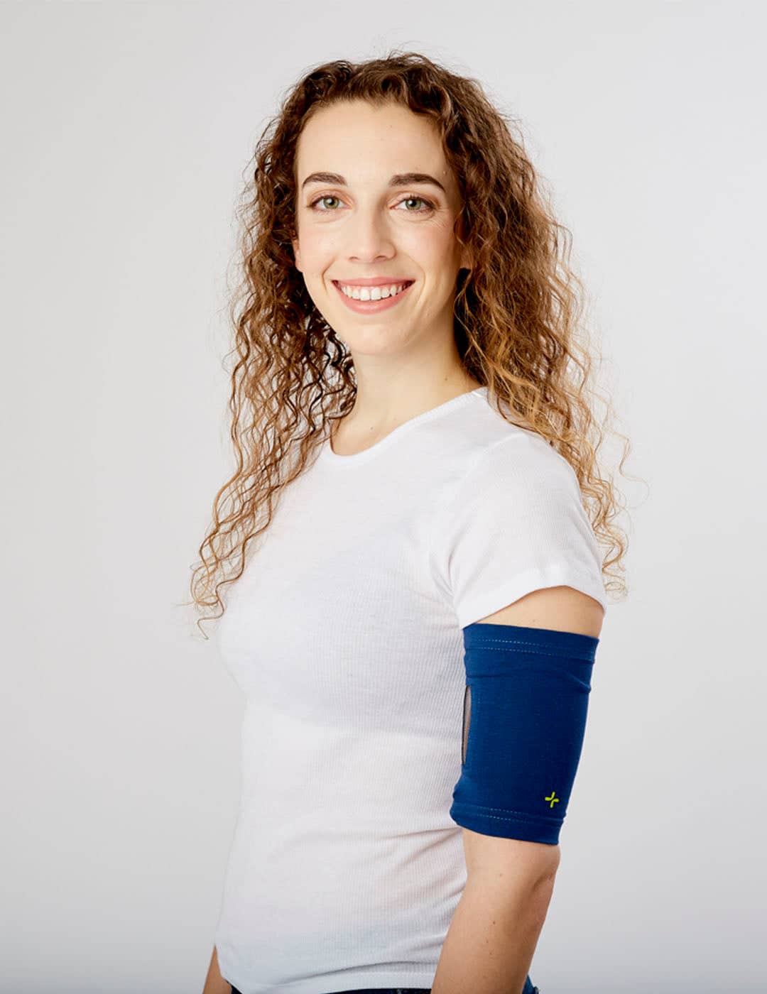 Durable camo Ultra Grip PICC line cover, offering a unique design with enhanced stability. Model is wearing size 9&quot;-11&quot; Bicep
