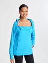 Women's chest port access hoodie in turquoise, offering a stylish and functional design for healthcare settings