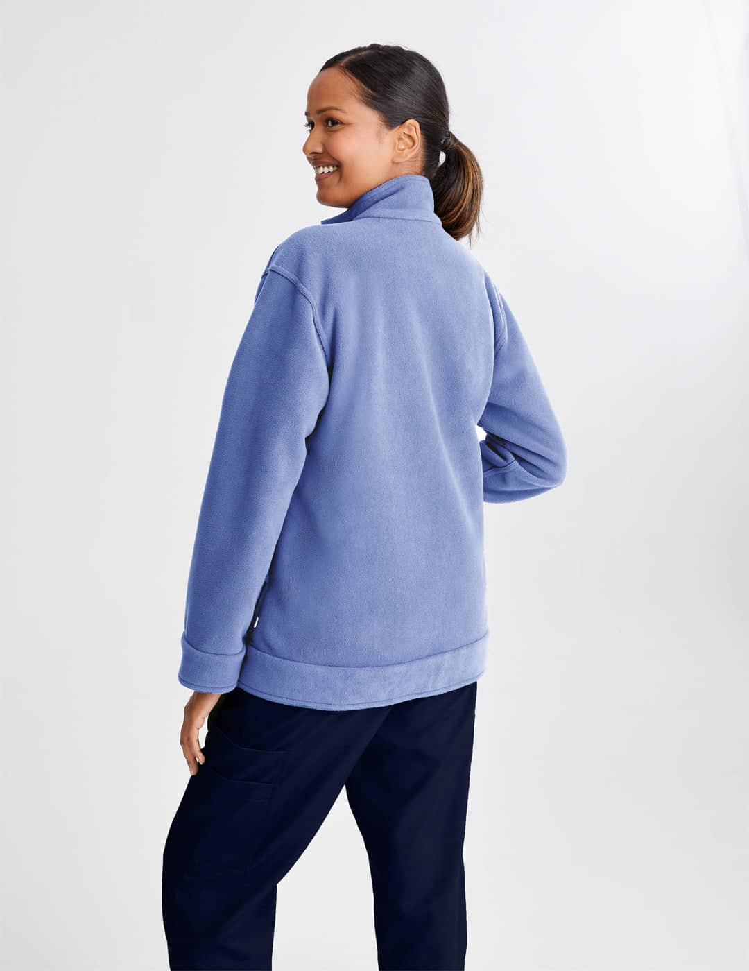 Women&#39;s black and gray reversible fleece jacket, offering a sleek and versatile design for healthcare professionals.