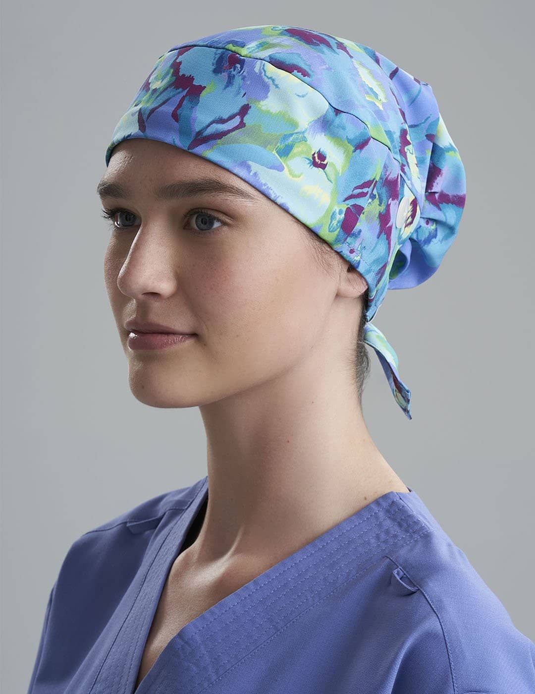 Women's surgical scrub cap in Spring Flora, featuring a vibrant floral print for stylish and comfortable wear.