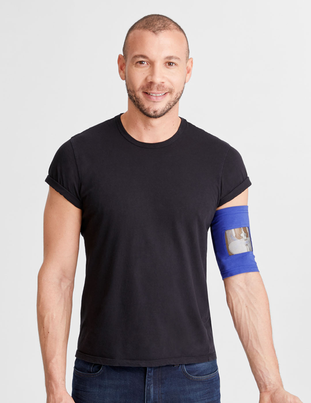 Stylish navy PICC line cover with ultra grip technology, providing dependable line protection. Model is wearing size 11&quot;-13&quot; Bicep