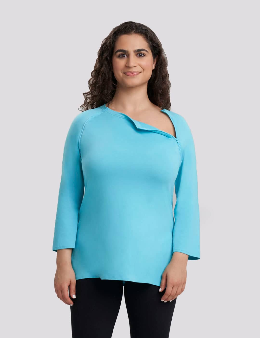 Women&#39;s chest port access shirt in teal, providing a modern and functional option for medical support